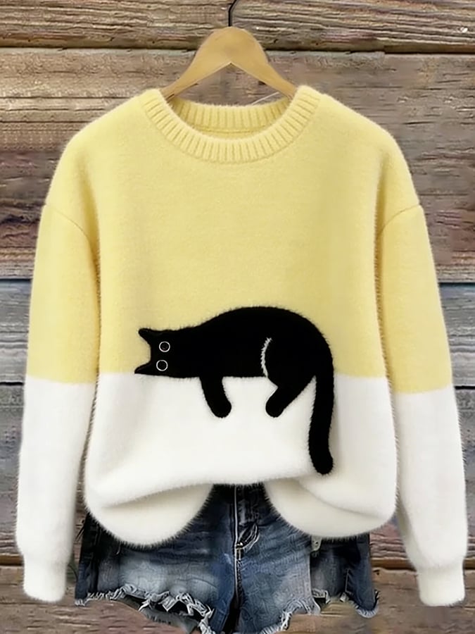 Carine jersey oversize con gato amarillo y blanco